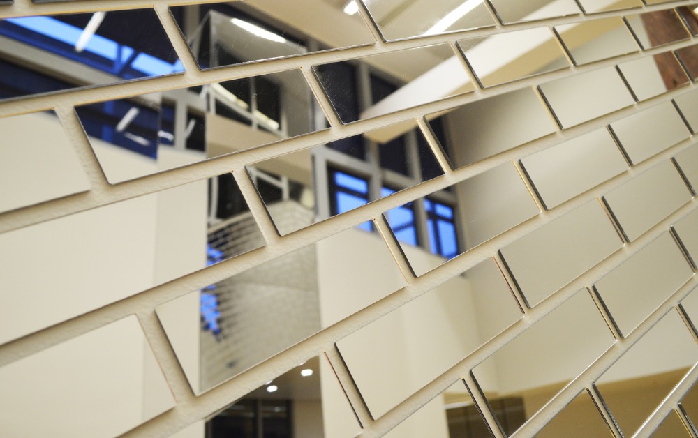 Why Choose Mirror Sheets for Retail Displays?